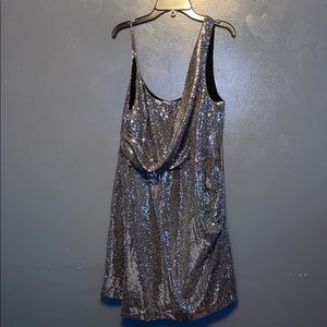 A super cute silver sparkly dress.
